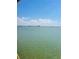 Beautiful, tranquil water view with a skyline in the distance with blue skies and puffy clouds at 6020 Shore S Blvd # 903, Gulfport, FL 33707