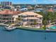 Waterfront home with private dock, pool, and lush landscaping at 6130 Kipps Colony W Dr, Gulfport, FL 33707