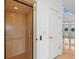 Home elevator with wood paneling providing easy access to multiple floors at 6130 Kipps Colony W Dr, Gulfport, FL 33707