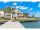 Waterfront estate with private dock and boat lift, expansive yard and pool at 6130 Kipps Colony W Dr, Gulfport, FL 33707