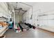Spacious garage with epoxy floors and shelving for ample storage at 6130 Kipps Colony W Dr, Gulfport, FL 33707