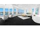 Serene main bedroom with water views, modern furnishings, and a luxurious ambiance at 6130 Kipps Colony W Dr, Gulfport, FL 33707