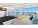 Main bedroom featuring water views, neutral colors, and a comfortable bed at 6130 Kipps Colony W Dr, Gulfport, FL 33707