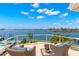 Balcony with seating area, offering panoramic views of the bay at 6130 Kipps Colony W Dr, Gulfport, FL 33707