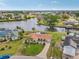 Aerial view showcasing this single-story home in its waterfront community at 6357 Spanish Main Dr, Apollo Beach, FL 33572