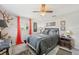 Unique bedroom featuring zebra print drawers and accents, as well as red curtains at 6357 Spanish Main Dr, Apollo Beach, FL 33572