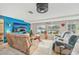 Comfortable Gathering room featuring a large TV and relaxed seating, perfect for entertaining at 6357 Spanish Main Dr, Apollo Beach, FL 33572