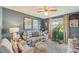 Comfortable living room with plush seating, decorative pieces and lots of natural light at 6357 Spanish Main Dr, Apollo Beach, FL 33572