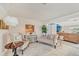 Cozy living room featuring stylish furniture, elegant decor, and bright natural light at 6357 Spanish Main Dr, Apollo Beach, FL 33572