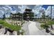 Observation tower with multiple levels and landscaping, offering panoramic views of the surrounding area at 6357 Spanish Main Dr, Apollo Beach, FL 33572