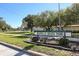 Apollo Beach Park sign with well-maintained grassy areas and mature trees in the background at 6357 Spanish Main Dr, Apollo Beach, FL 33572