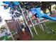 Children playing on a modern playground structure, promoting active and imaginative play in a safe environment at 6357 Spanish Main Dr, Apollo Beach, FL 33572