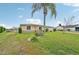 Lovely home with an expansive lawn and beautiful landscaping at 6357 Spanish Main Dr, Apollo Beach, FL 33572