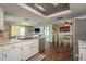 Open layout of kitchen with dining area featuring stainless steel appliances at 6831 Greenwich Ave, New Port Richey, FL 34653