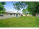 Lush, green backyard offers serene views and ample space at 7338 Coventry Dr, Port Richey, FL 34668