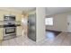 Kitchen featuring stainless steel appliances and granite countertops at 7338 Coventry Dr, Port Richey, FL 34668
