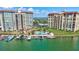 Waterfront condominiums boasting boat slips and a pool overlooking the bay in a scenic coastal setting at 736 Island Way # 303, Clearwater Beach, FL 33767