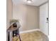 Foyer view of the suite entrance and ceramic tile flooring with a decorative table and lamp at 736 Island Way # 303, Clearwater Beach, FL 33767