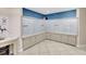 Community mail room with secure mailboxes and a convenient package drop-off area at 736 Island Way # 303, Clearwater Beach, FL 33767