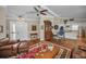 Warm and inviting living room featuring hardwood floors and a comfortable seating area at 7944 Royal Hart Dr, New Port Richey, FL 34653