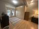 Bright bedroom with built-in wardrobes and a tranquil view from glass doors at 8618 Snowy Owl Way, Tampa, FL 33647