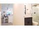 Contemporary bathroom with glass shower, modern vanity, and stylish fixtures at 9921 Gulf Blvd, Treasure Island, FL 33706