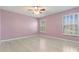 Spacious bedroom with large window and ample natural light at 12110 75Th St, Largo, FL 33773