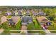 Ariel shot of the property showcasing the house and well-maintained lawn at 12280 Lyon Pine Ln, Odessa, FL 33556