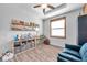 Bedroom with wood look floors and ceiling fan at 12280 Lyon Pine Ln, Odessa, FL 33556