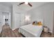 Comfortable bedroom with hardwood floors and closet at 12280 Lyon Pine Ln, Odessa, FL 33556