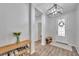 Welcoming entryway featuring modern decor and a shoe rack at 12280 Lyon Pine Ln, Odessa, FL 33556