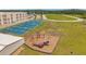 Features outdoor recreational facilities: a playground, basketball court, track, and soccer field at 12280 Lyon Pine Ln, Odessa, FL 33556