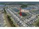 A bird's-eye view of the neighborhood, showcasing the location of the property in relation to the community's lakes at 13227 Great Plains Dr, Riverview, FL 33579