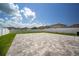 Spacious concrete patio with a white vinyl fence, perfect for outdoor entertaining at 13227 Great Plains Dr, Riverview, FL 33579