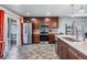 Bright kitchen with stainless steel appliances, custom cabinets, granite countertops, and sliding glass doors at 13511 Fladgate Mark Dr, Riverview, FL 33579