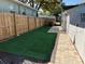 Backyard and fencing to offer a private outdoor area suitable for various activities or relaxation at 1408 San Juan Ct, Clearwater, FL 33756