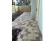 Paver patio leading to fenced yard at 1408 San Juan Ct, Clearwater, FL 33756