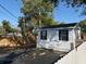 Detached structure and backyard, complemented by a wooden fence that enhances the feeling of privacy at 1408 San Juan Ct, Clearwater, FL 33756