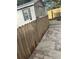 Backyard with a wood fence, shed, and paver patio at 1408 San Juan Ct, Clearwater, FL 33756