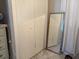 Bedroom closet with a mirror perfect for personal grooming or showcasing style and is paired with an additional dresser at 1408 San Juan Ct, Clearwater, FL 33756
