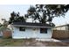 Charming home featuring a quaint entryway, simple design, and inviting facade at 1408 San Juan Ct, Clearwater, FL 33756