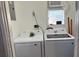 Laundry room with a modern washer and dryer set at 1408 San Juan Ct, Clearwater, FL 33756