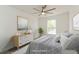 Bedroom featuring modern decor, bed, and large window at 14319 Morristown Ave, Port Charlotte, FL 33981