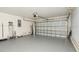 Spacious two-car garage with an automatic garage door at 14319 Morristown Ave, Port Charlotte, FL 33981