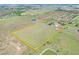 Large property featuring a home surrounded by scenic landscape, offering a serene and private setting at 14655 Joe Sumner Rd, Wimauma, FL 33598