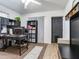 Functional home office featuring a desk, shelves, and storage, perfect for remote work or study at 14655 Joe Sumner Rd, Wimauma, FL 33598