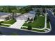 Aerial view of a home with a pristine lawn, landscaping, and an extended driveway at 1920 Folkstone Pl, Wesley Chapel, FL 33543
