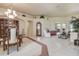 Spacious living room with tile flooring, neutral walls, and abundant natural light, perfect for entertaining at 1920 Folkstone Pl, Wesley Chapel, FL 33543