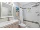 Well-lit bathroom with tiled shower, updated fixtures, and modern vanity at 201 11Th S Ave, Safety Harbor, FL 34695