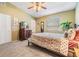 Comfortable bedroom with carpeted floors, ceiling fan and a bright, airy feel at 201 11Th S Ave, Safety Harbor, FL 34695